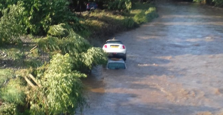 Terrifying footage shows car being pulled under water by dangerous floods in Derry