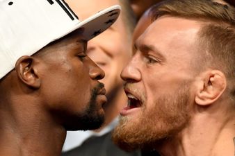 WATCH: Conor McGregor was seriously pumped up as he faced down Floyd Mayweather at the weigh-in