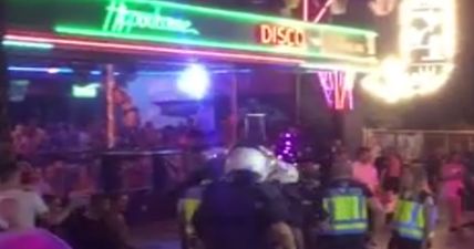 WATCH: Main strip in Benidorm on lockdown as police in riot gear raid pubs and nightclubs