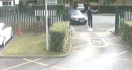 Scary footage shows man knocking down a teacher outside of a school