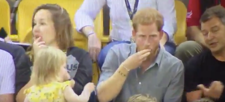 VIDEO: Prince Harry acts like a complete champ when a toddler steals his popcorn