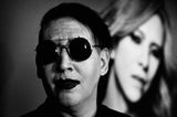 WATCH: Marilyn Manson brings lifelike gun onstage during concert to make a point