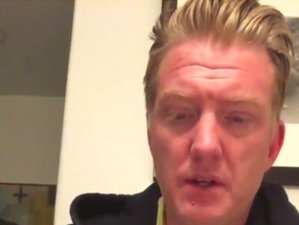 Josh Homme from Queens Of The Stone Age issues apology for kicking female photographer