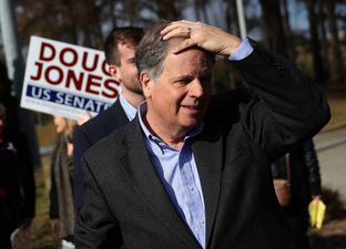 Democrat Doug Jones wins Alabama seat in humiliating Senate result for Trump