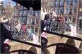 WATCH: English fans filmed launching full cups of booze onto boatful of people and diving into canal in Amsterdam