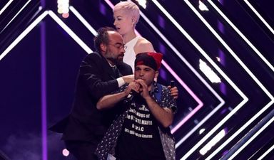 Australian commentator calls the Eurovision stage invader an ‘absolute cockhead’ on live TV