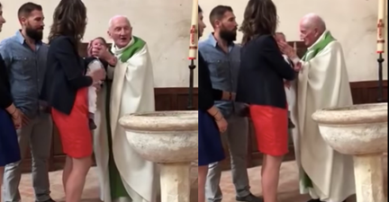 The priest who was seen slapping a crying baby has tried to explain his actions