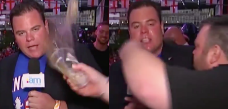 TV reporter gets beer thrown in his face during a very volatile report on the England match