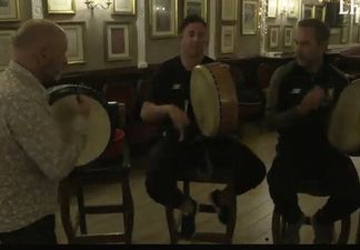 WATCH: Liverpool legends try their hand at a Irish trad music session while in Dublin