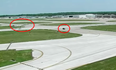 Scary scenes as an airplane that’s taking off narrowly misses a van that’s crossing the runway