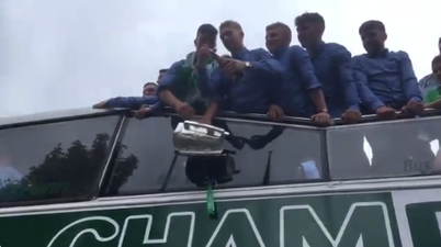 WATCH: Hurler Cian Lynch catches a bottle of Buckfast, shakes it up and makes it rain on Limerick fans
