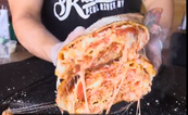 WATCH: Do you think you could take down this giant pizza-burrito?
