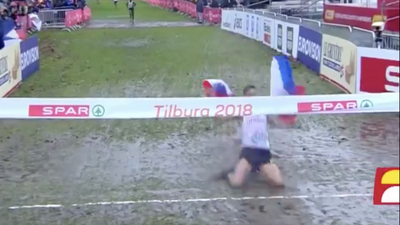 WATCH: Cross country runner’s attempt at a knee slide fails miserably