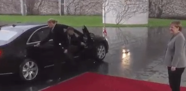 WATCH: Theresa May got locked inside her own car before meeting Angela Merkel