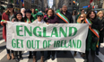 Simon Coveney absolutely slates Mary Lou McDonald after she stands next to anti-British flag in parade