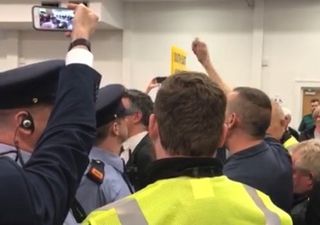 WATCH: Eoghan Murphy surrounded by protestors at election count centre