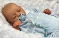 A YouTuber family are selling a doll version of their baby son