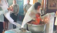 Priest suspended after baby suffers injuries during violent baptism service