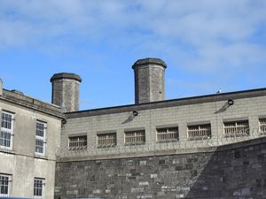 Three prisoners safely removed after spending the night on roof of Mountjoy Prison
