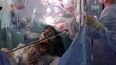 Woman plays violin while surgeons remove tumour from her brain