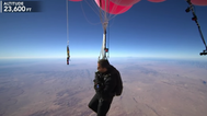 David Blaine floats at 25,000 feet with helium balloons in latest stunt