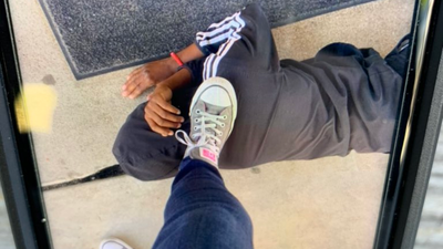 Teacher resigns after taking photo of their foot on black student’s neck