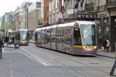 Group of 20 young men board Luas and assault passenger
