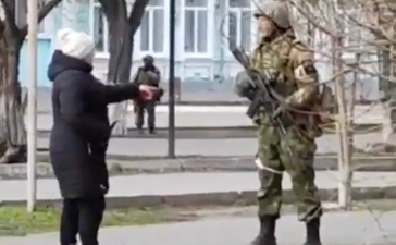WATCH: Ukrainian woman bravely confronts Russian soldier on the street
