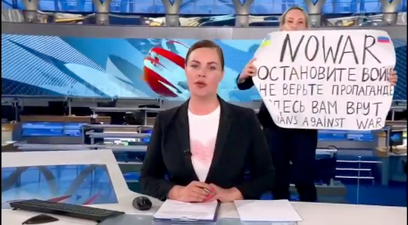 WATCH: Russian news editor arrested following anti-war protest live on air