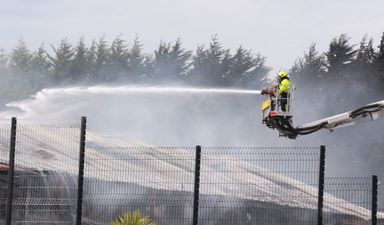 Gardaí and emergency services battling “significant” fire at factory in Carlow