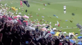 Football fans throw stuffed toys onto pitch for earthquake victims