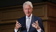 From one Presidential visit to another, Bill Clinton arrives in Belfast