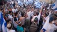 Israeli’s chant “Death to Arabs” and attack journalists in latest threat to Palestine