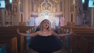 Catholic priest stripped of duties after allowing pop star to film provocative music video in church