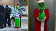 Grinch stands outside primary school with ‘Santa is fake’ sign