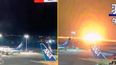 Plane bursts into flames after landing at Tokyo airport