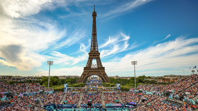 Eiffel Tower evacuated as man seen climbing structure hours before Olympic closing ceremony