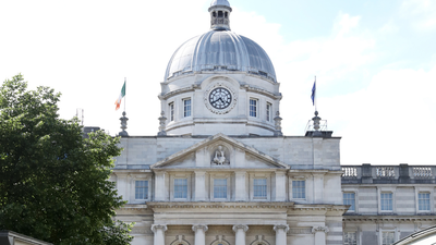 Man arrested after van rams into several gates at Government Buildings