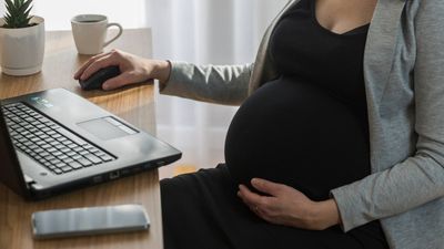 Woman receives huge payout after boss fires her for morning sickness with jazz hands emoji